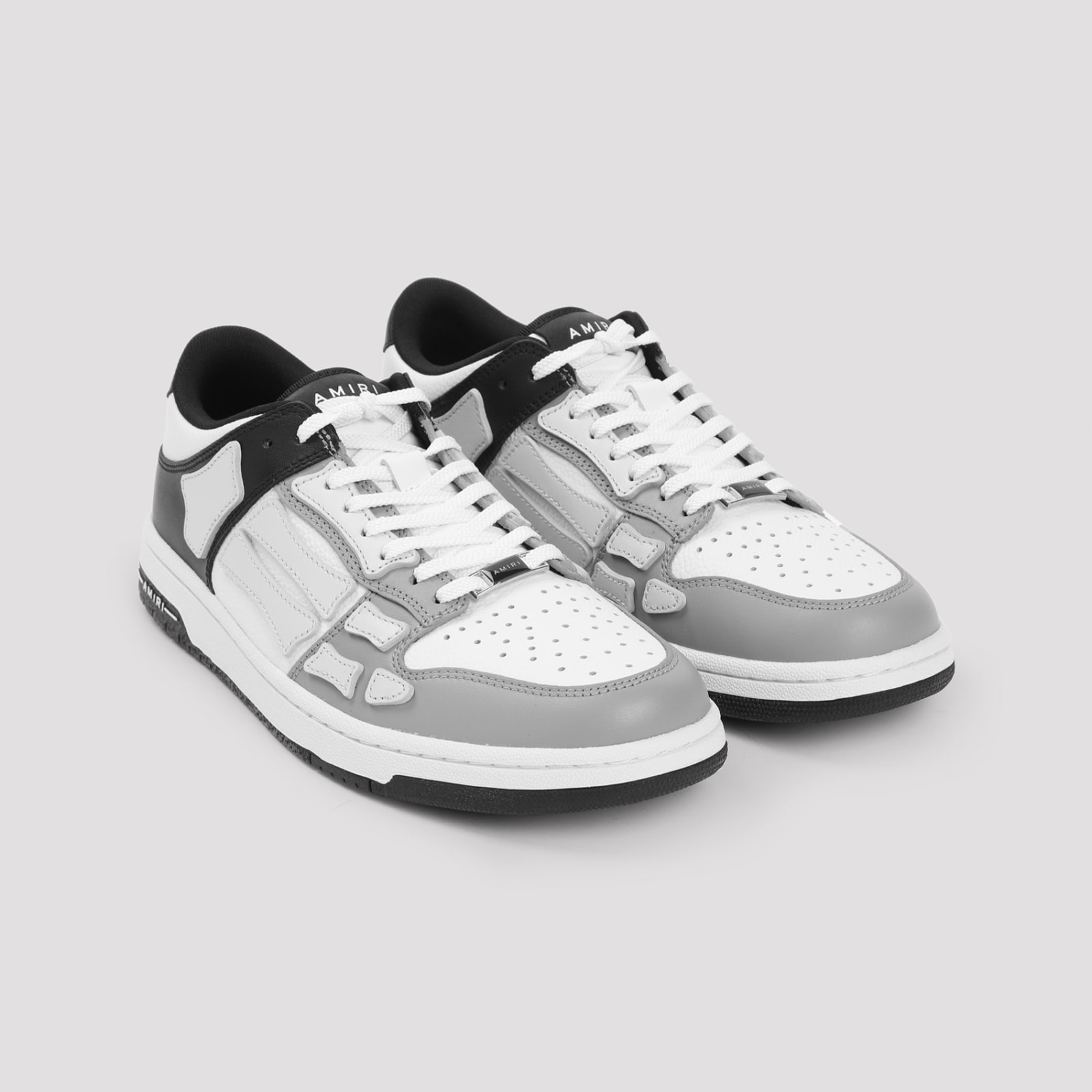 Shop Amiri Two-tone Skel Top Low Sneakers In Black White Grey