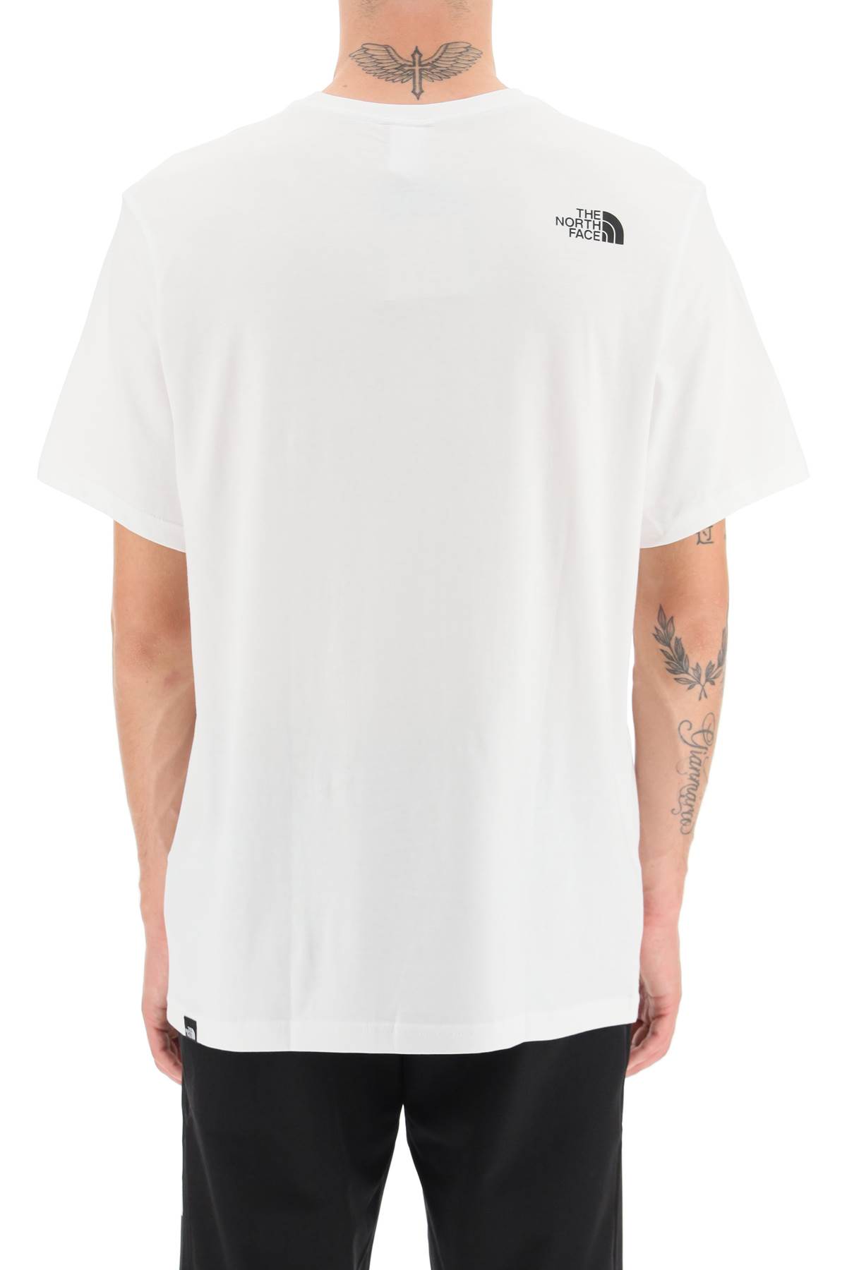 Shop The North Face Oversized Logo T-shirt In Tnf White Tnf Black (white)