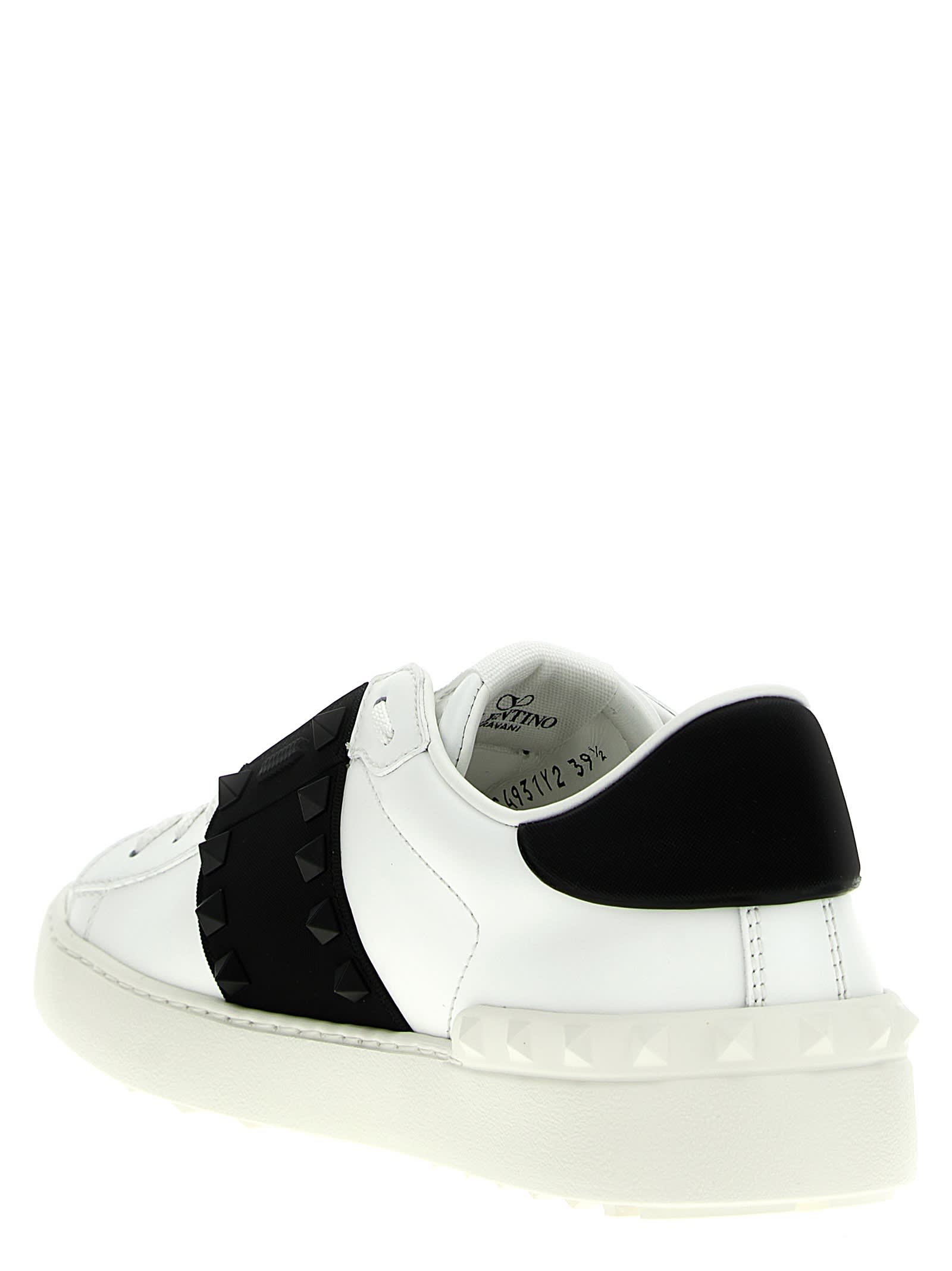 Shop Valentino Garavani Rockstud Untitled Sneakers In White/black