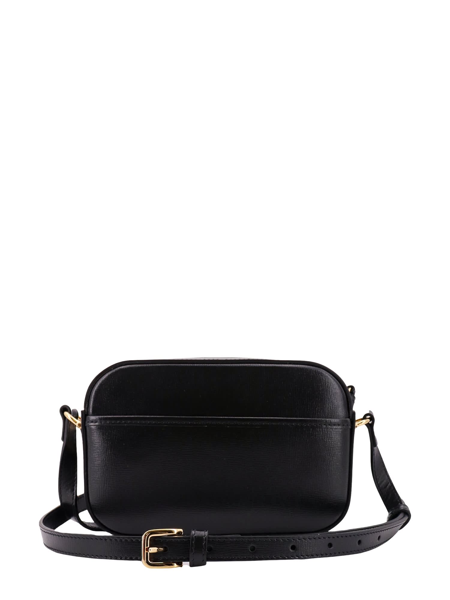 GUCCI HORSEBIT SHOULDER BAG BY TOM FORD, black canvas with black leather  trims and handle, adjustable shoulder strap, copper toned horsebit and  central satin stripe, 26cm x 18cm H x 7cm.