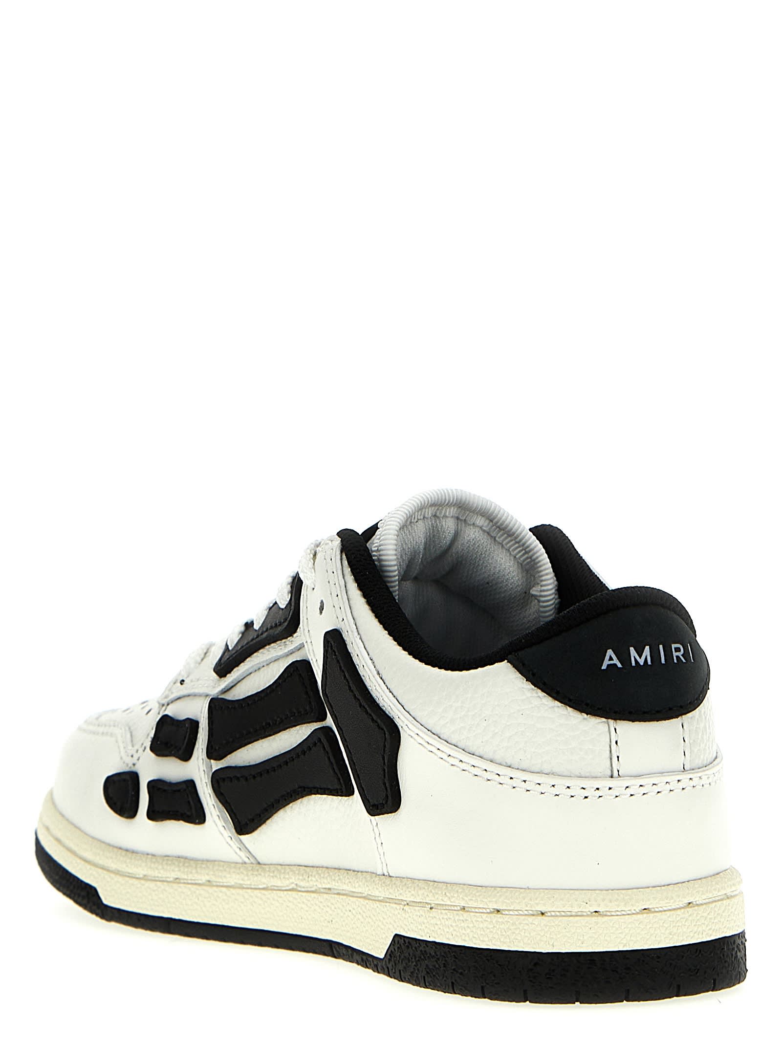 Shop Amiri Asymmetric Low Sneakers In White Black