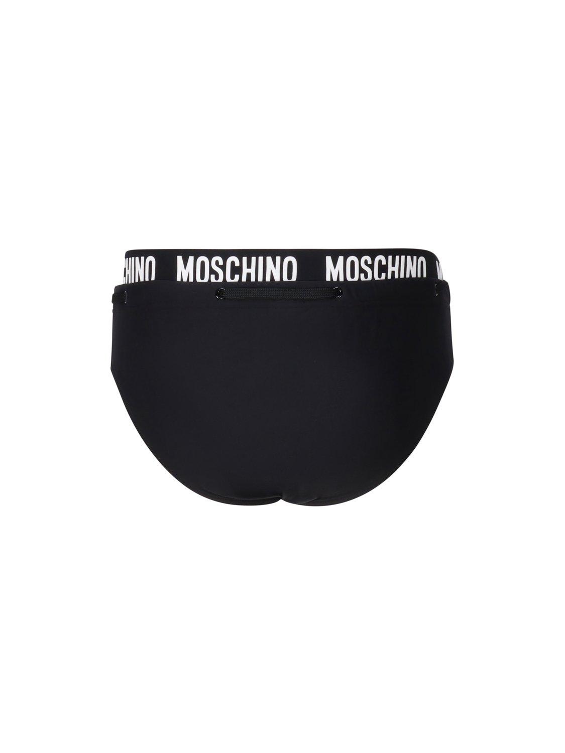 Shop Moschino Logo Waistband Drawstring Swim Briefs In Black