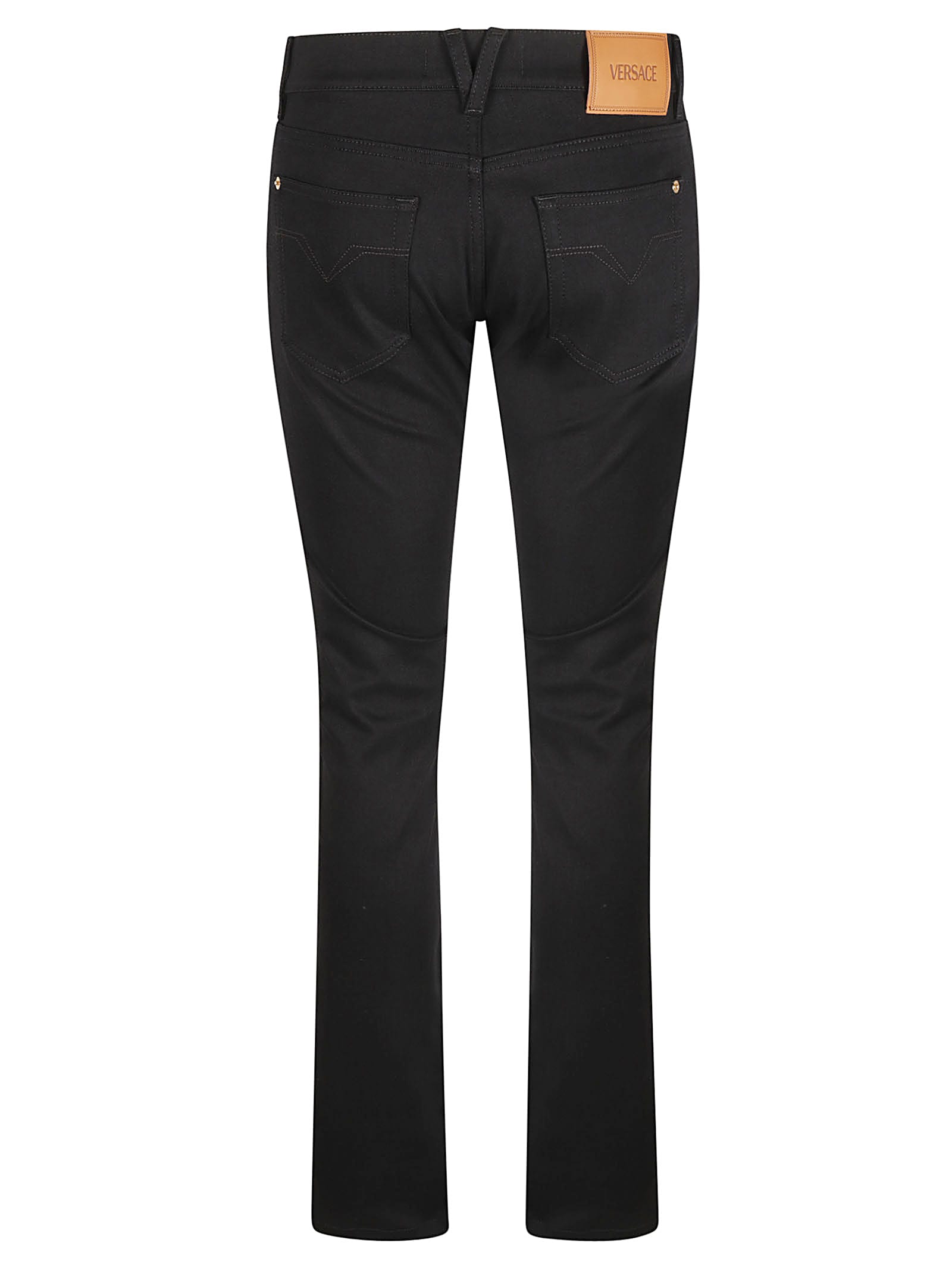 Shop Versace Button Fitted Jeans In Black