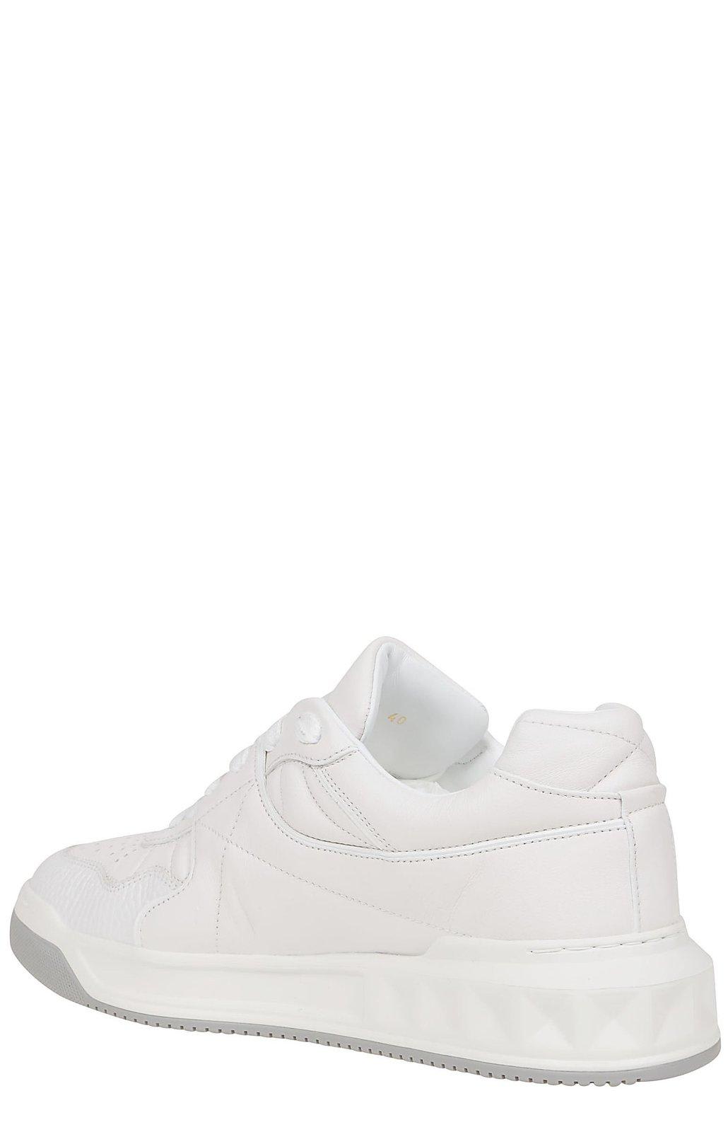 Shop Valentino Garavani Roman Stud Lace-up Sneakers In White