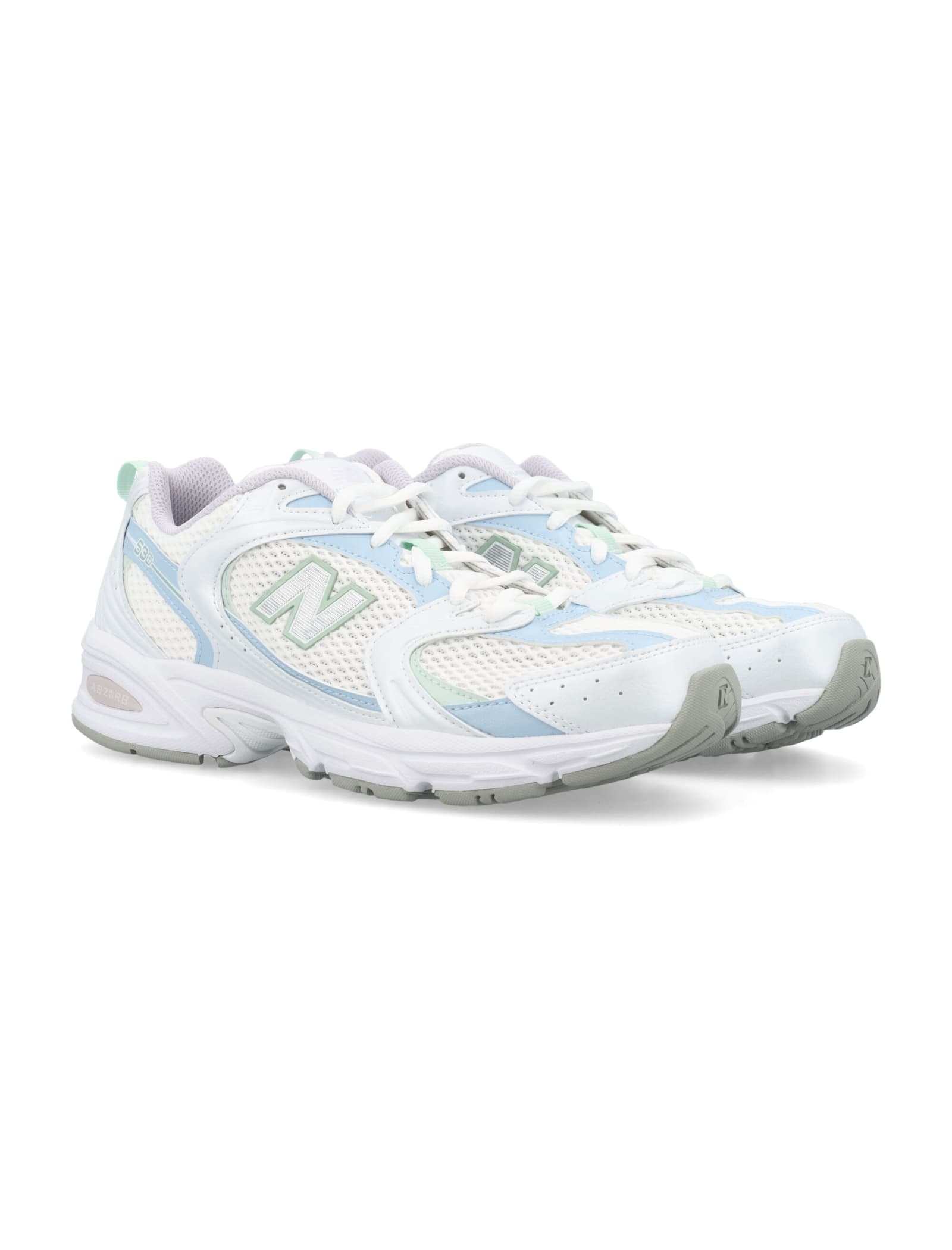 Shop New Balance 530 Sneakers In White/light Blue