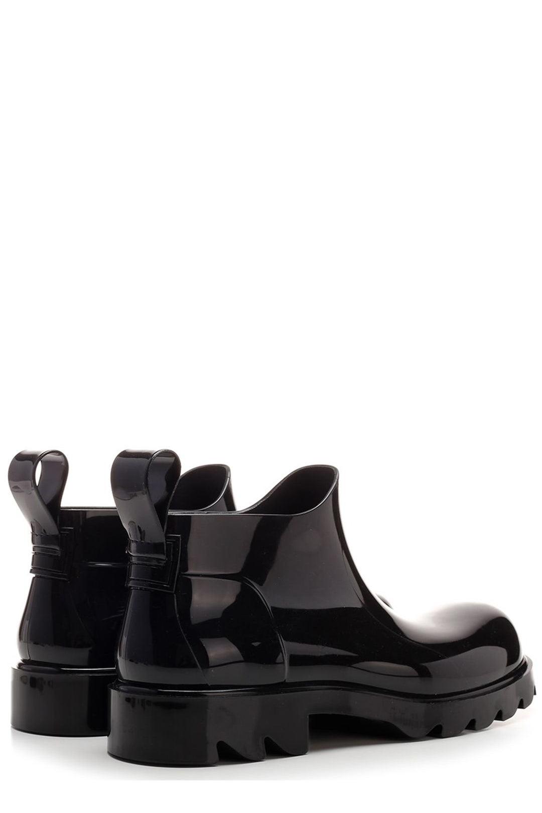 Shop Bottega Veneta Stride Ankle Boots In Black