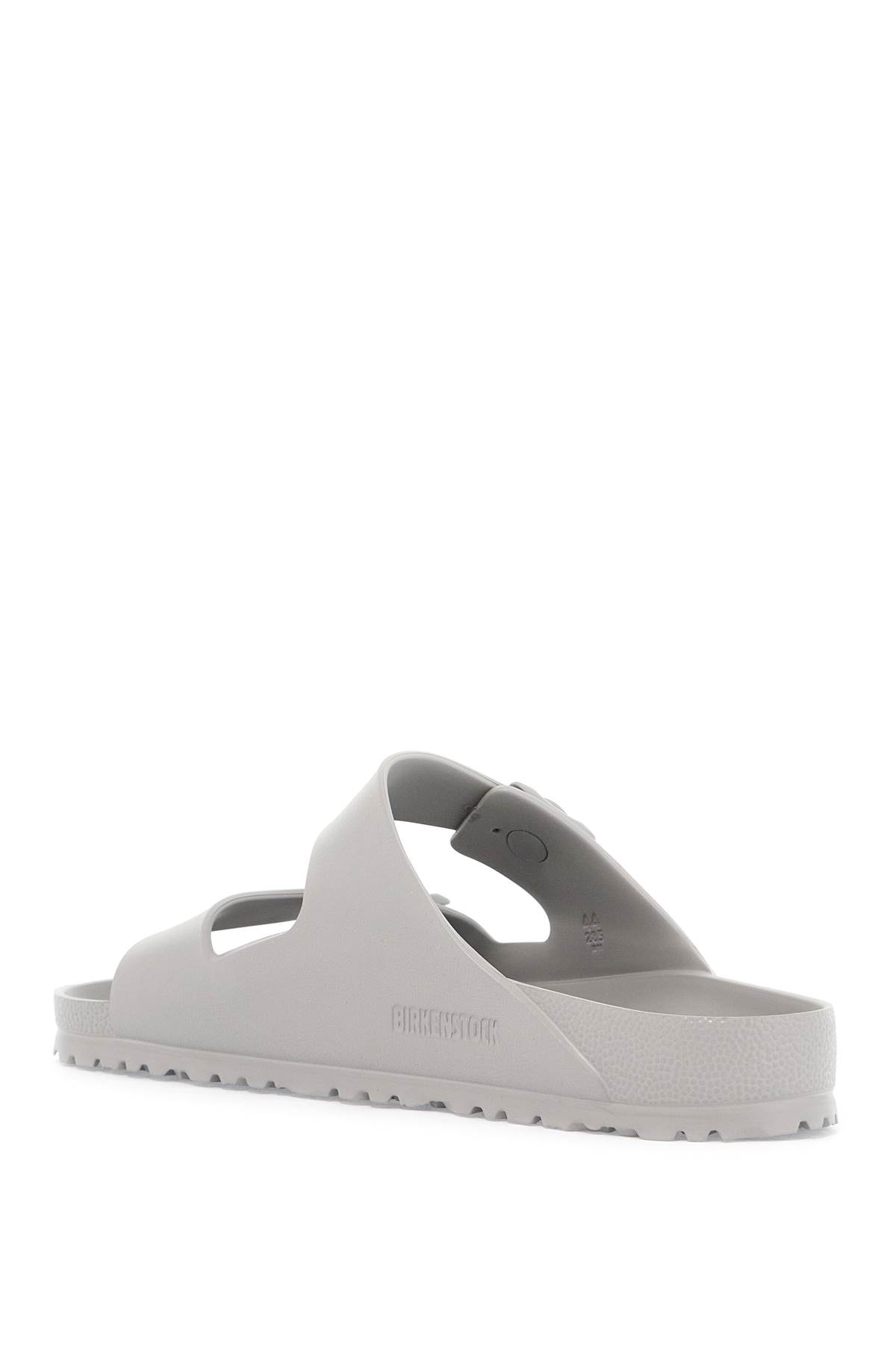 Shop Birkenstock Arizona Eva Slides Narrow Fit In Stone Coin (grey)