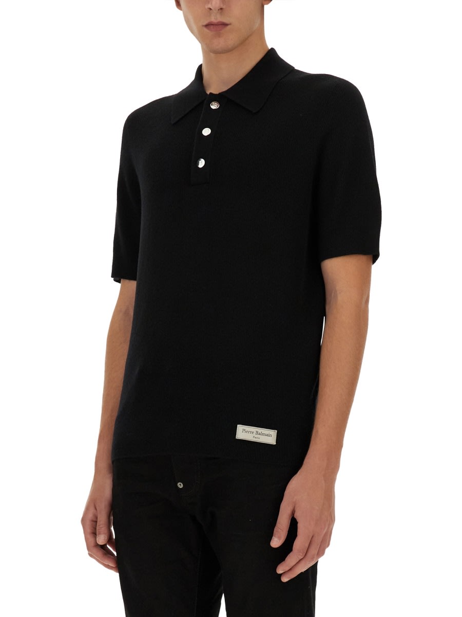 Shop Balmain Merino Wool Polo Shirt In Black