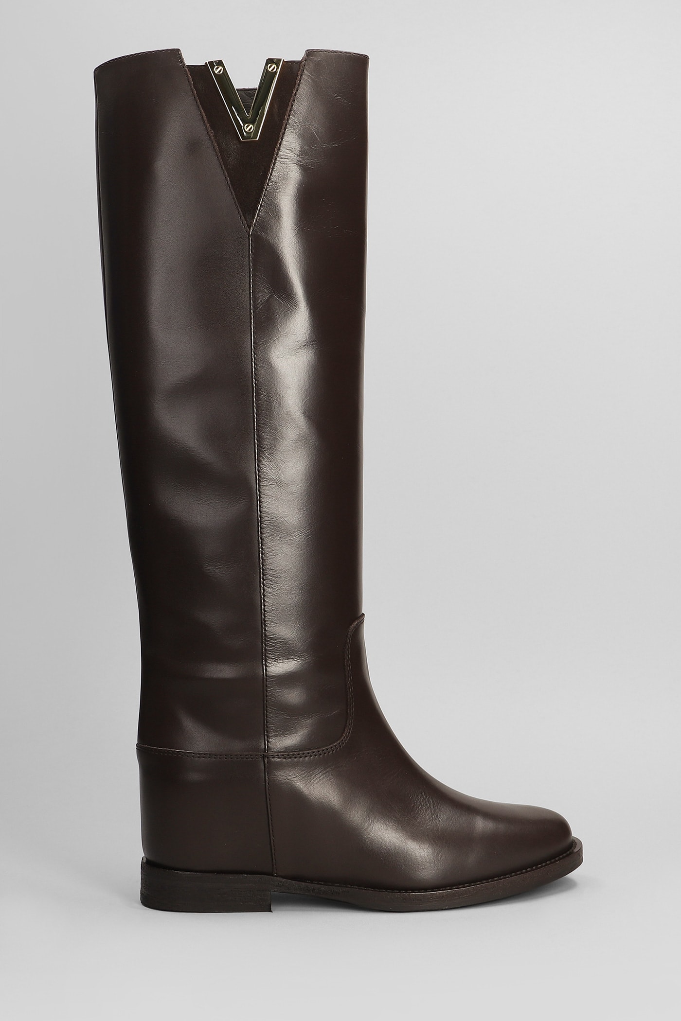In Dark Brown Leather