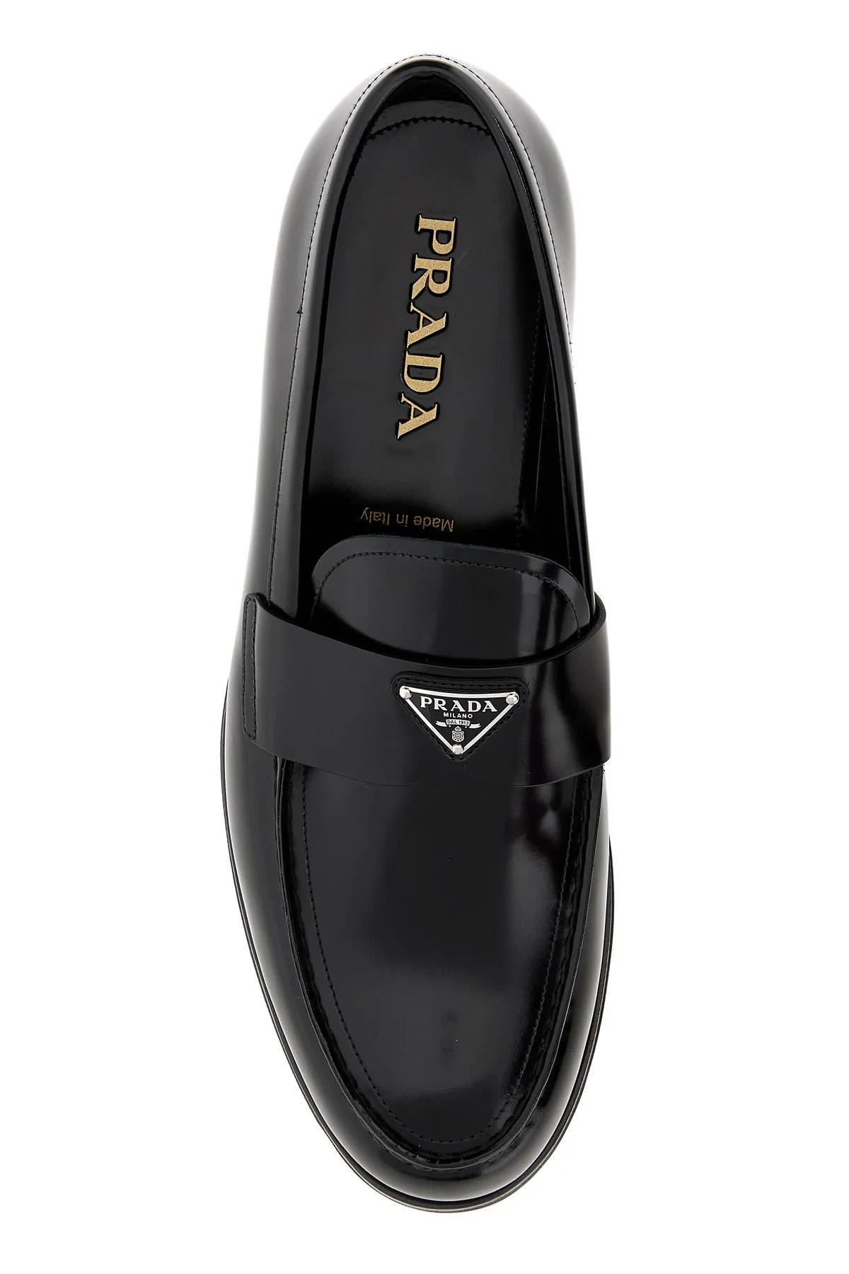 Shop Prada Black Leather Loafers In Nero