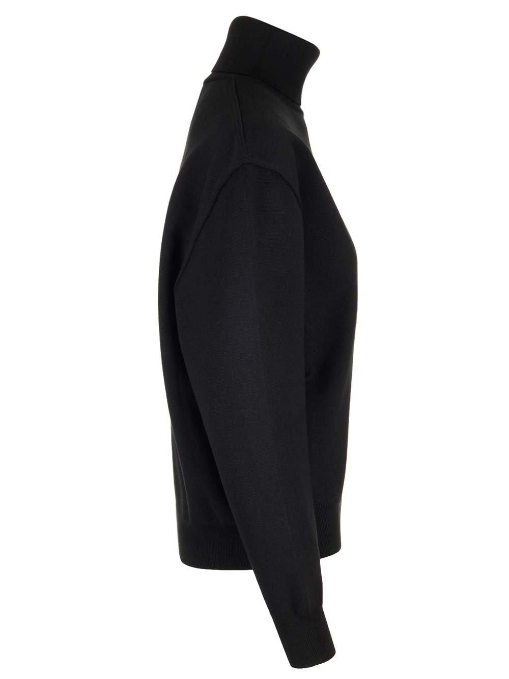 Shop Alaïa Roll Neck Ribbed Jumper In Black