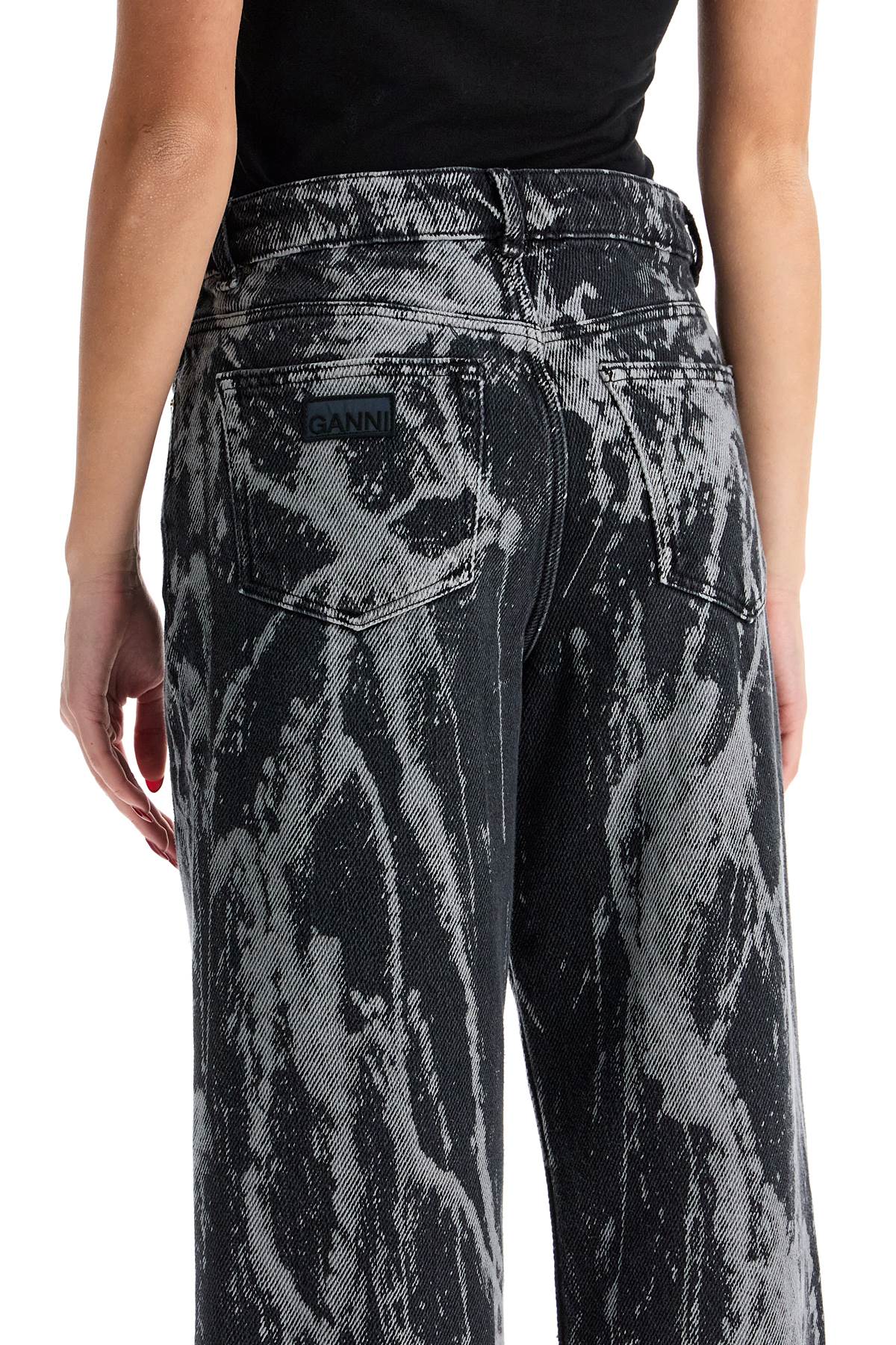 Shop Ganni Tie-dye Jeans In Washed Black/black (black)