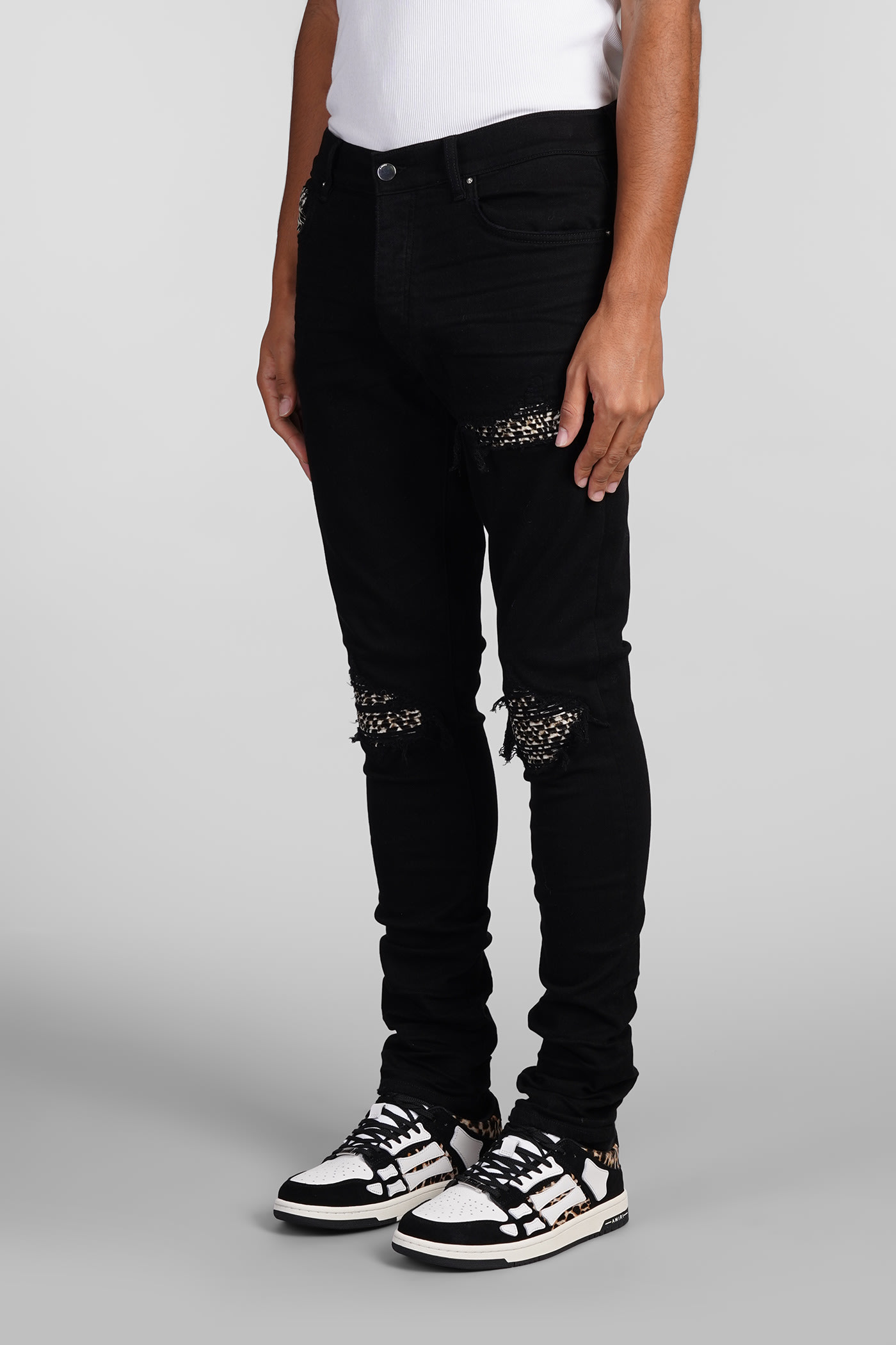 Shop Amiri Jeans In Black Cotton