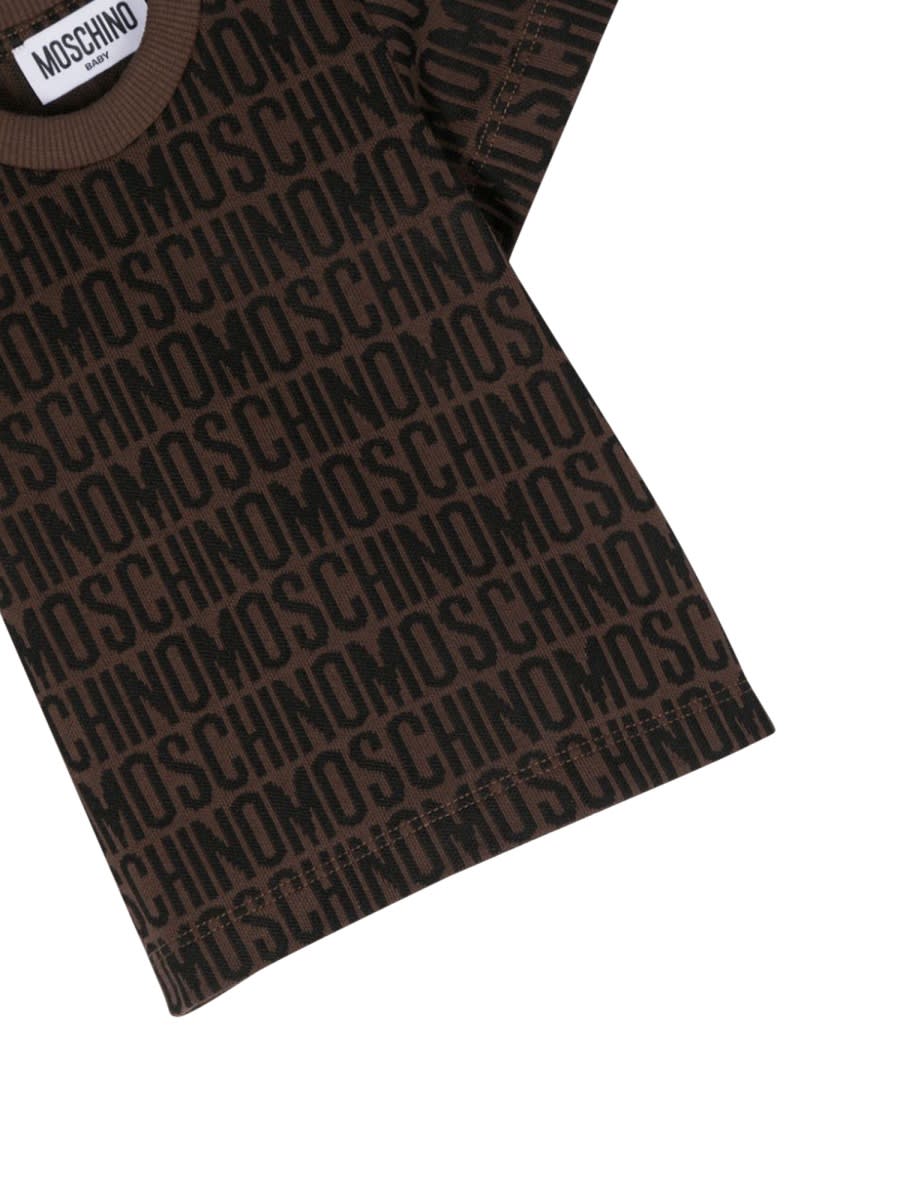 Shop Moschino T-shirt In Brown
