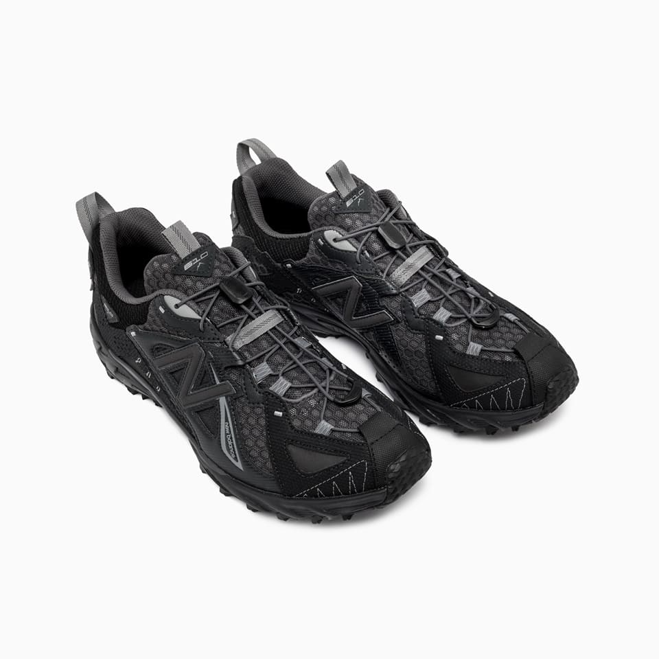 Shop New Balance 610xv1 Sneakers Ml610xj In Black