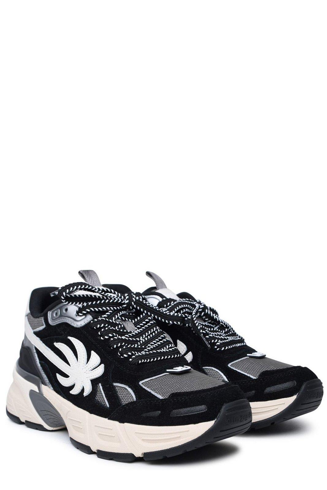 Shop Palm Angels The Palm Runner Round Toe Sneakers In Black Grey