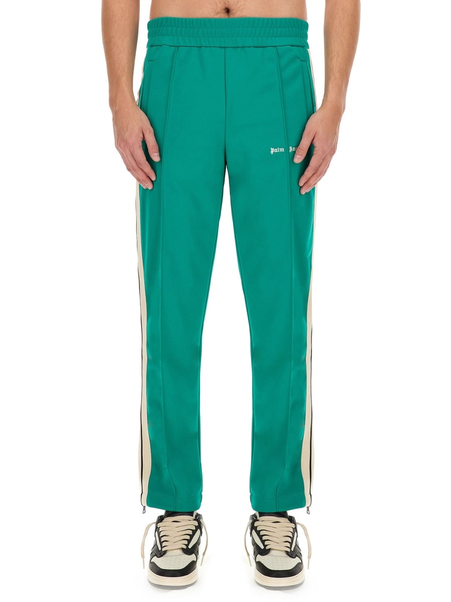 Shop Palm Angels Pants With Logo In Verde