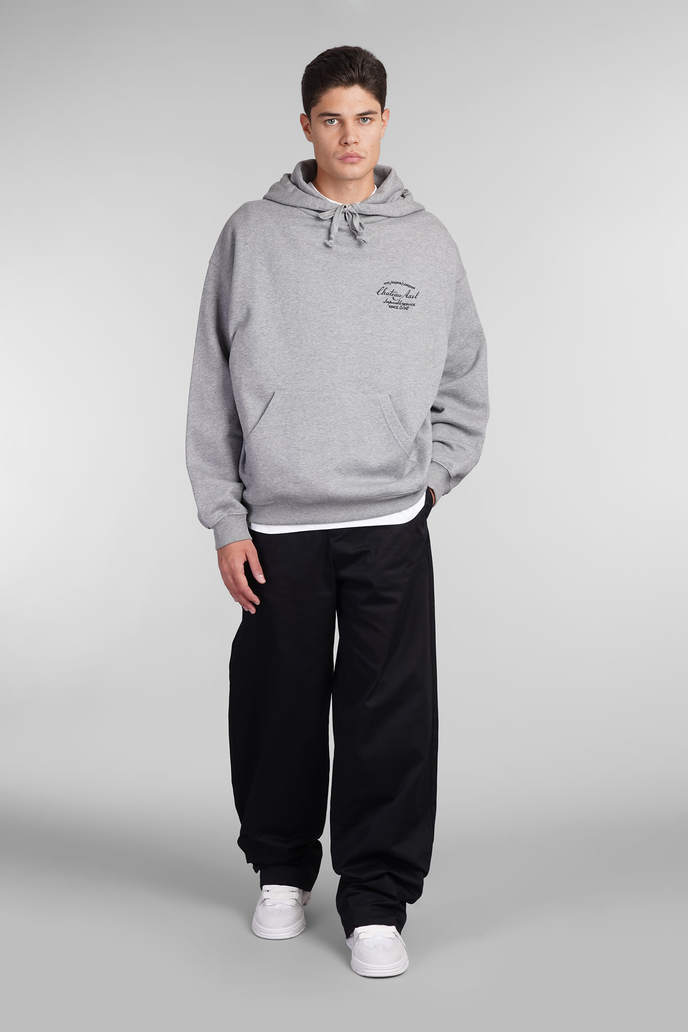 Axel Arigato Logo-tag Trousers In Black