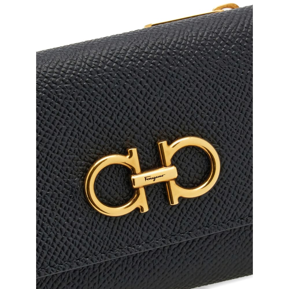 Ferragamo Gancini Tri-fold Leather Wallet In Black