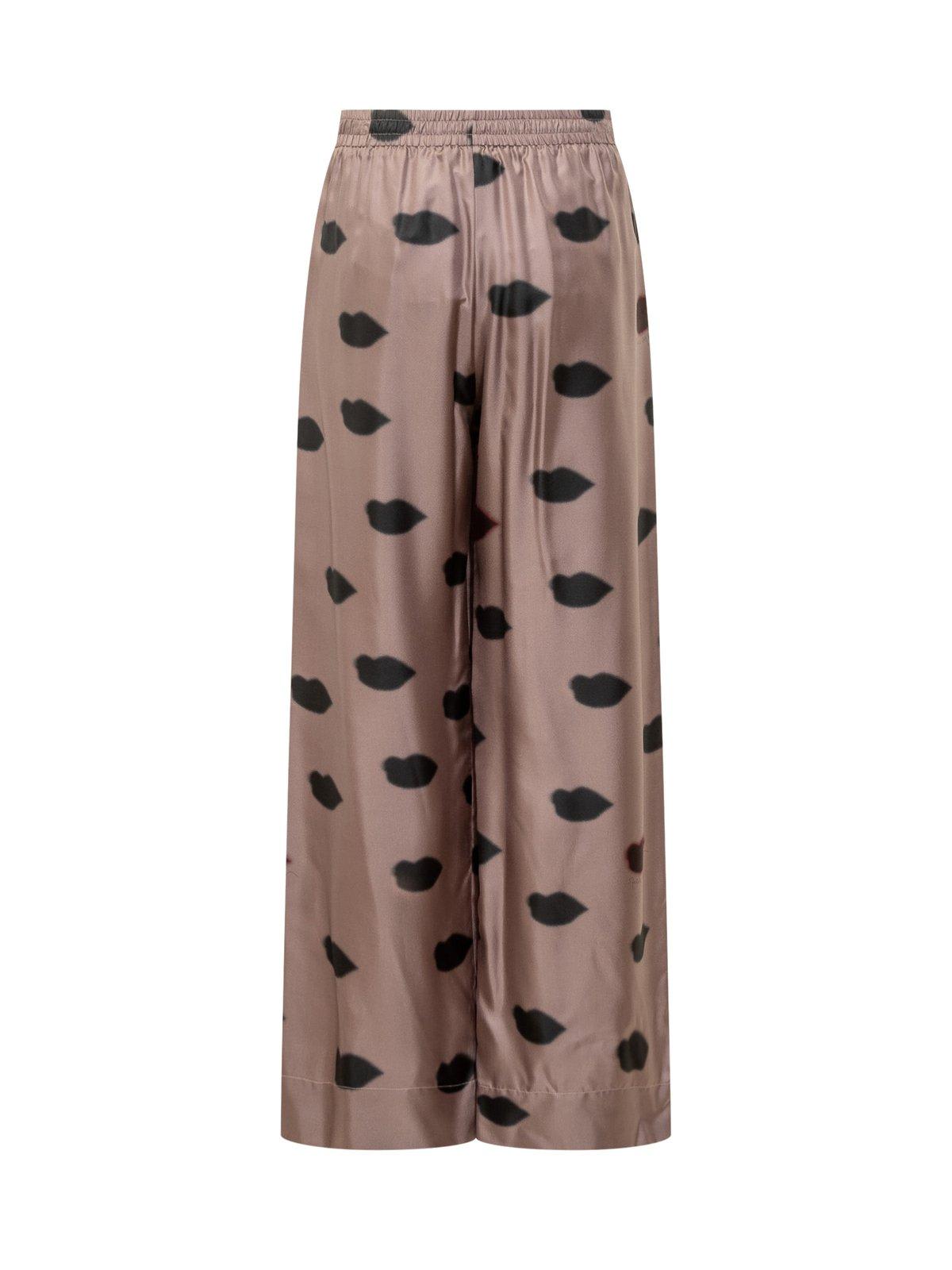 Shop Stella Mccartney Oversized Lips Printed Trousers In Light Taupe