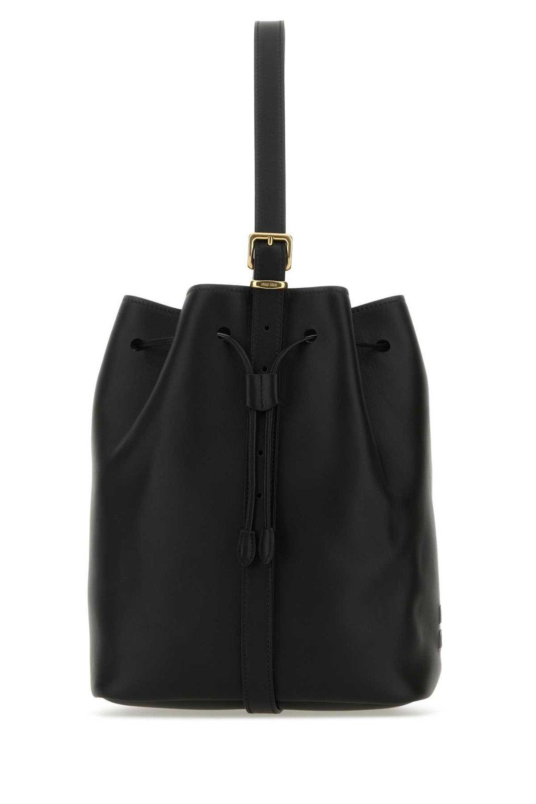 Shop Miu Miu Logo-embossed Drawstring Bucket Bag In Nero