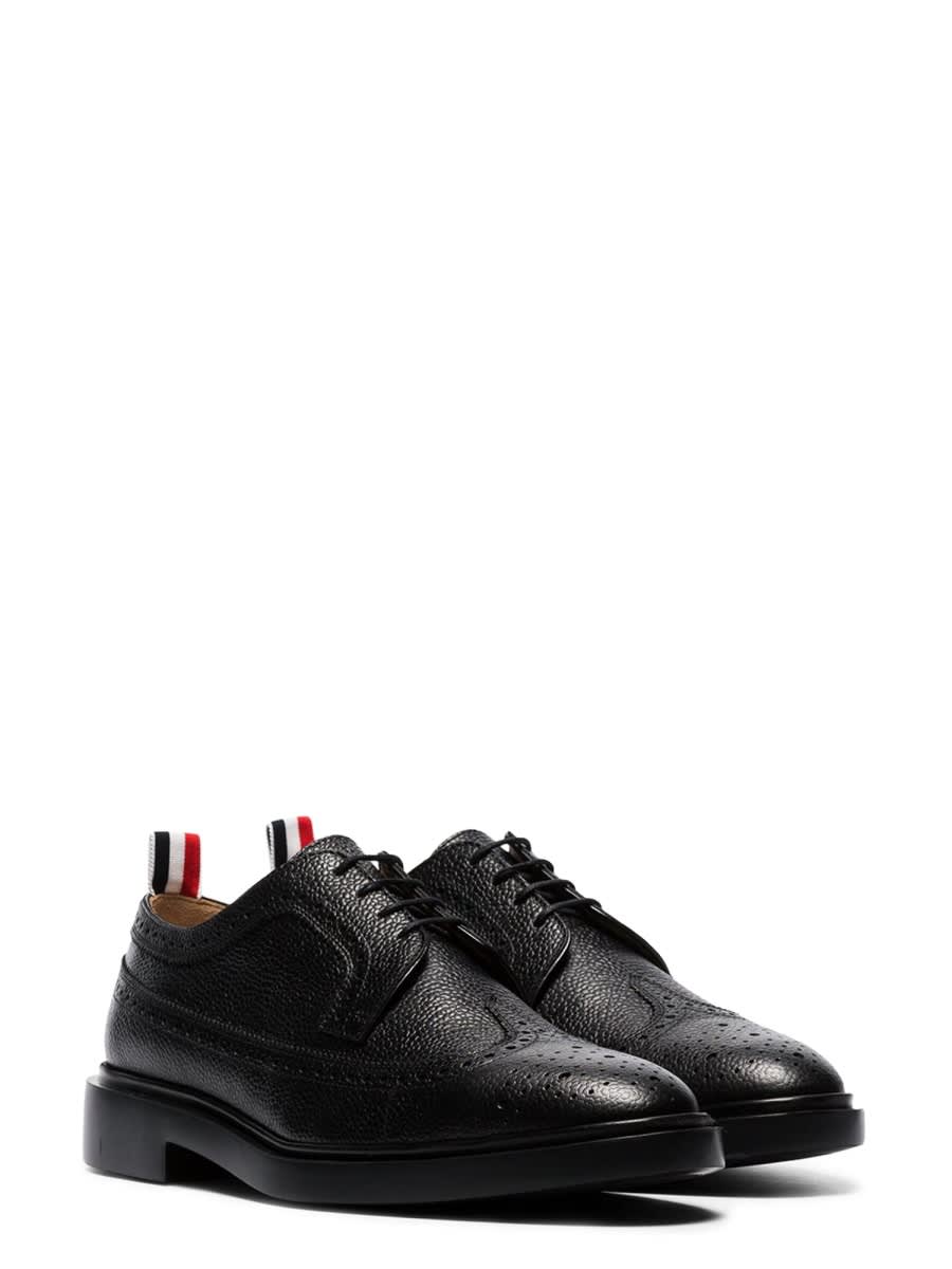 Shop Thom Browne Lace-up Longwing Brogue In Black