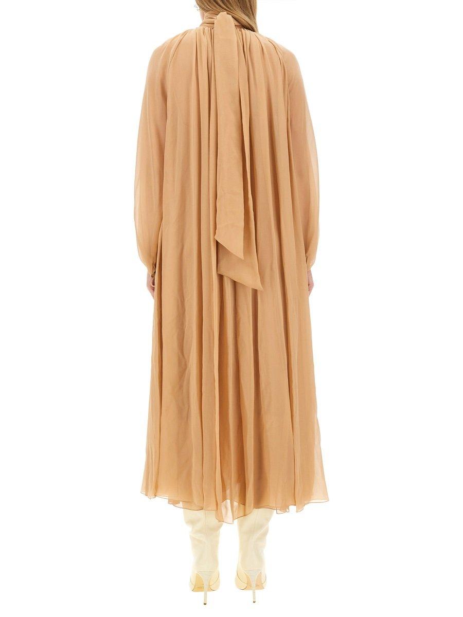 Shop Chloé Mock-neck Gathered Maxi Dress In Beige