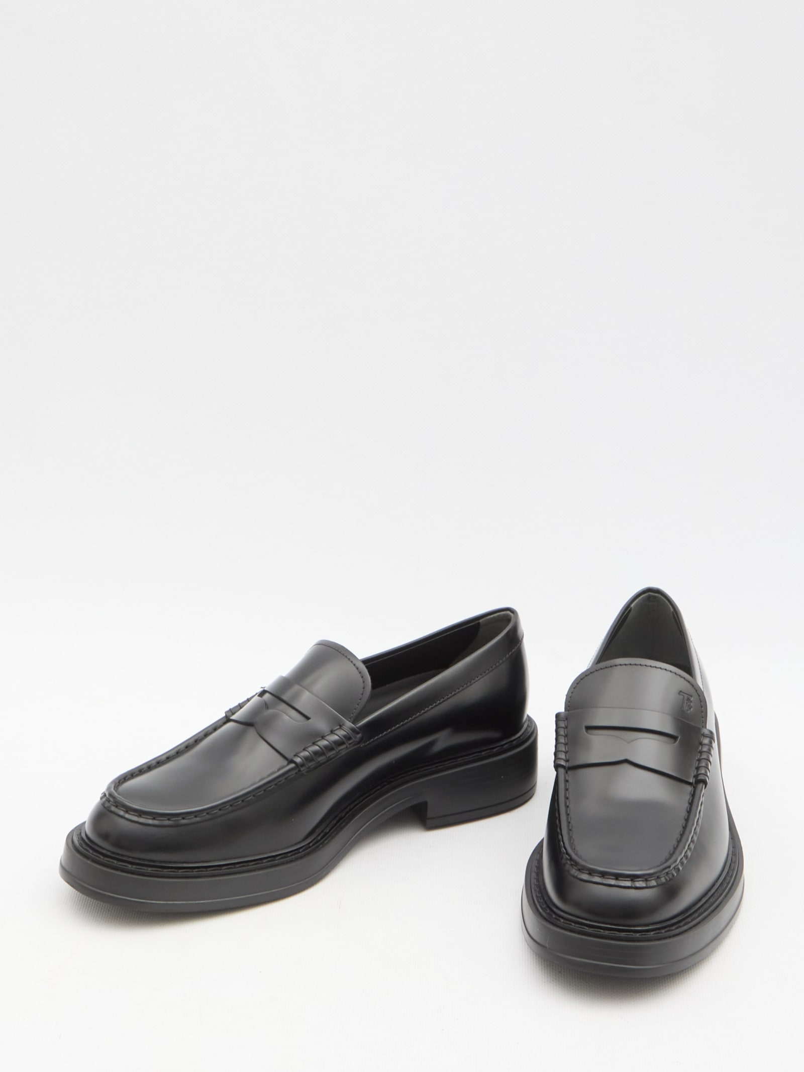 Shop Tod's Leather Loafers In Black