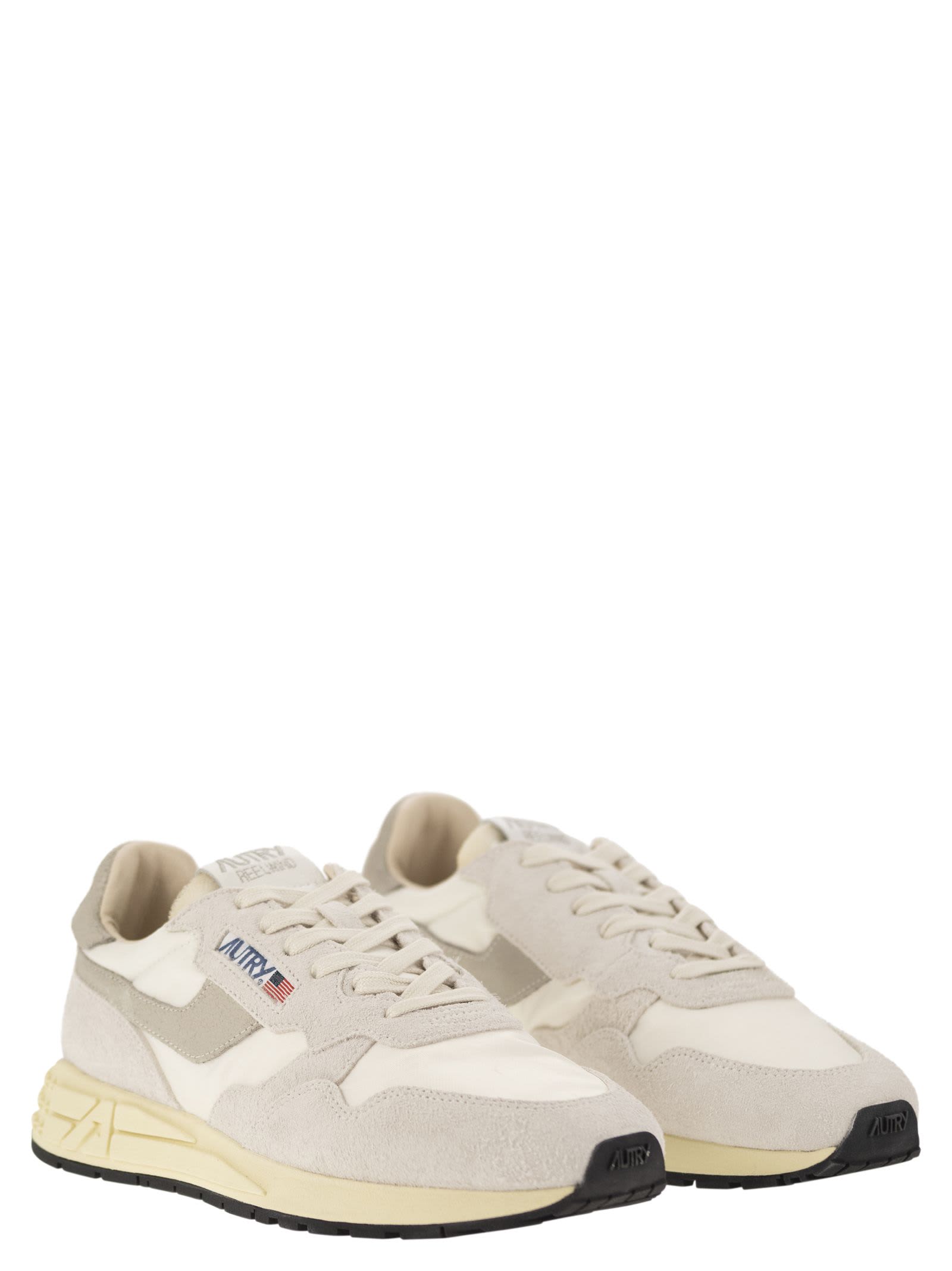 Shop Autry Reelwind - Suede And Technical Textile Trainer In Wht/nat