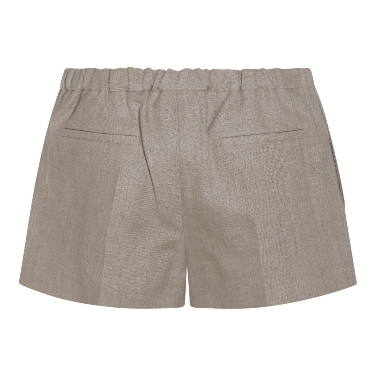 Shop Valentino Mid-rise Pleated Shorts In Beige
