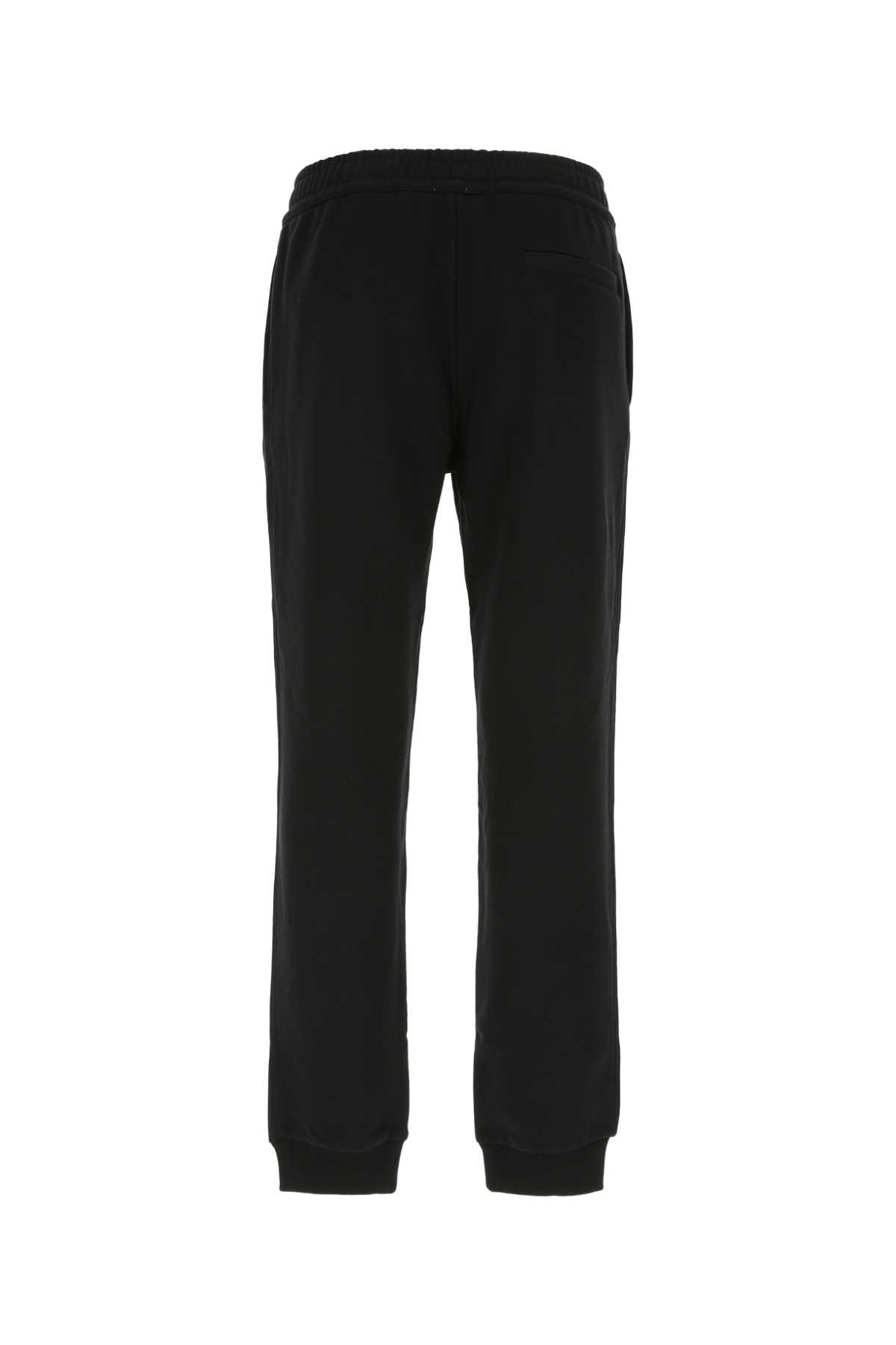 Shop Burberry Black Cotton Joggers In A1189