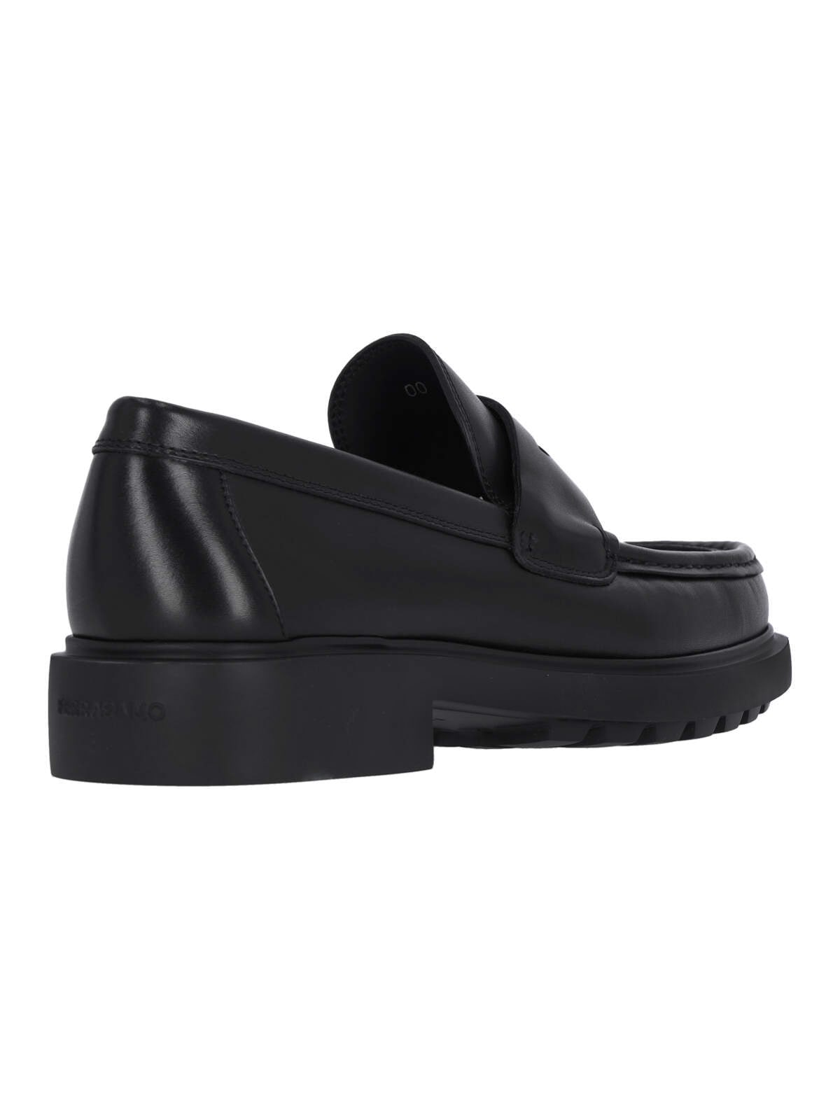 Shop Ferragamo Penny Loafers In Black