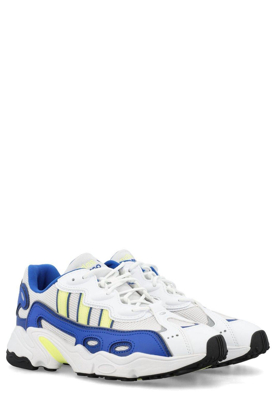 Shop Adidas Originals Ozweego Lace-up Sneakers In Ftwwht/pulyel/royblu