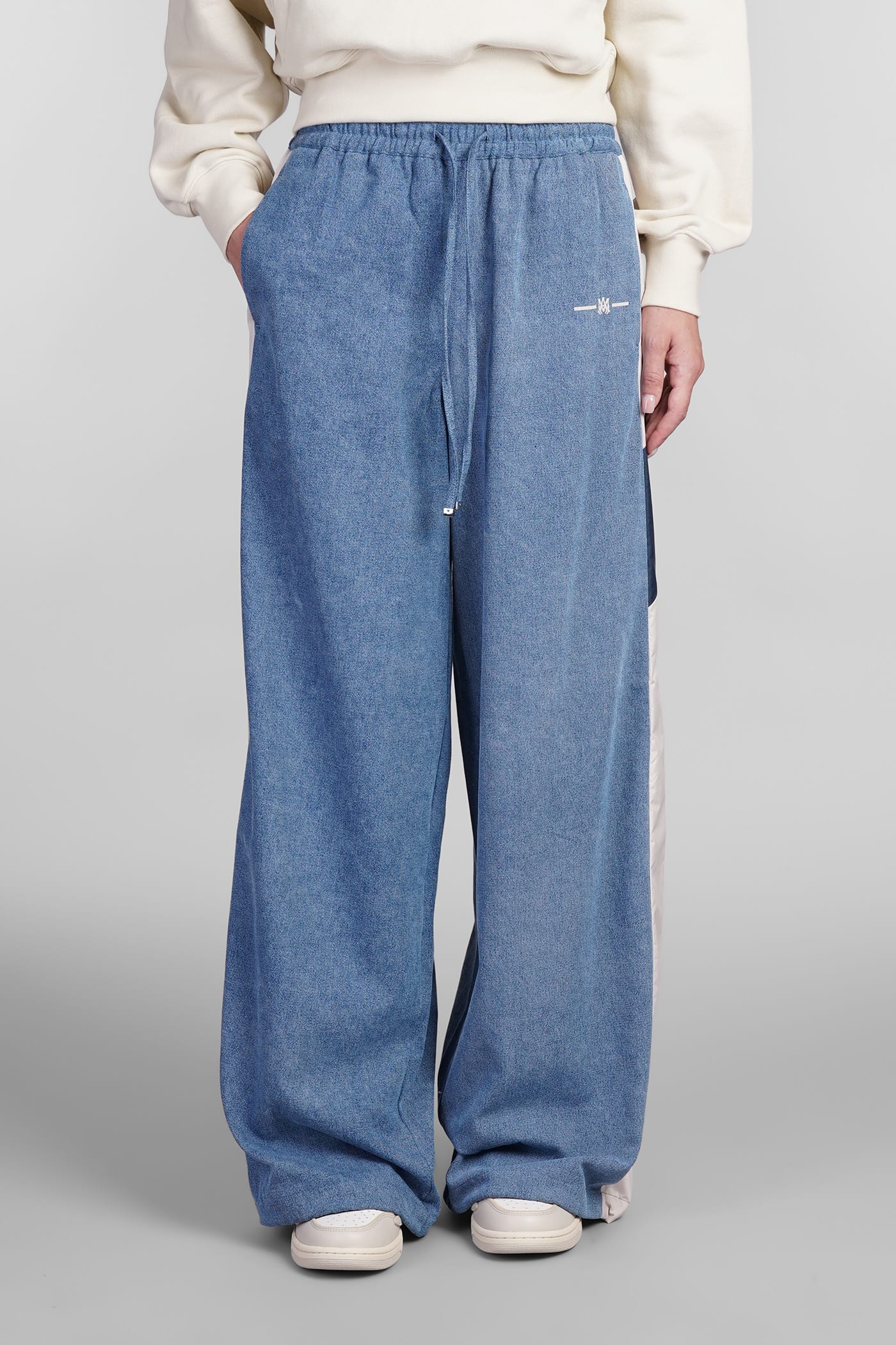 Shop Amiri Pants In Blue Nylon