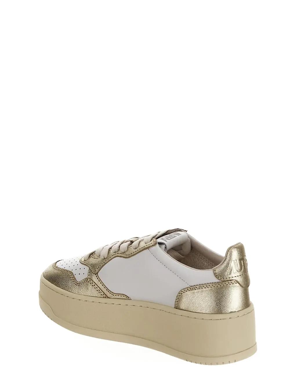 Shop Autry Platform Low Sneakers In Golden