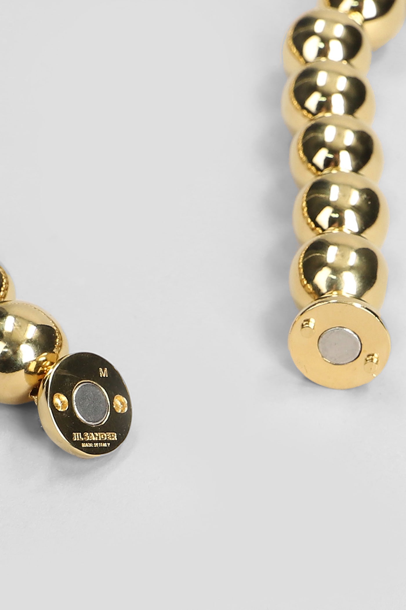 Jil Sander In Gold Brass In Gold