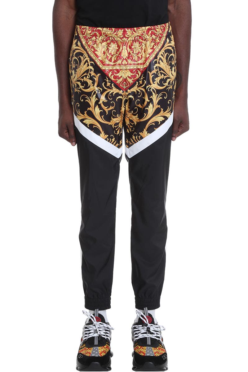 VERSACE PANTS IN BLACK POLYESTER,11211874
