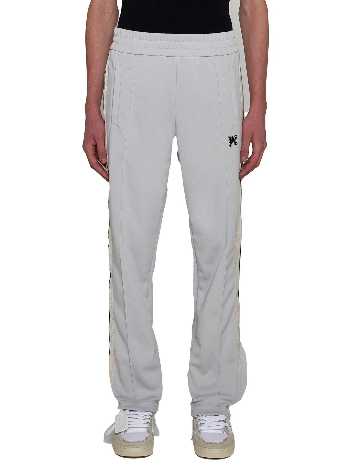 Shop Palm Angels Logo Embroidered Side Stripe Detailed Pants In Grigio