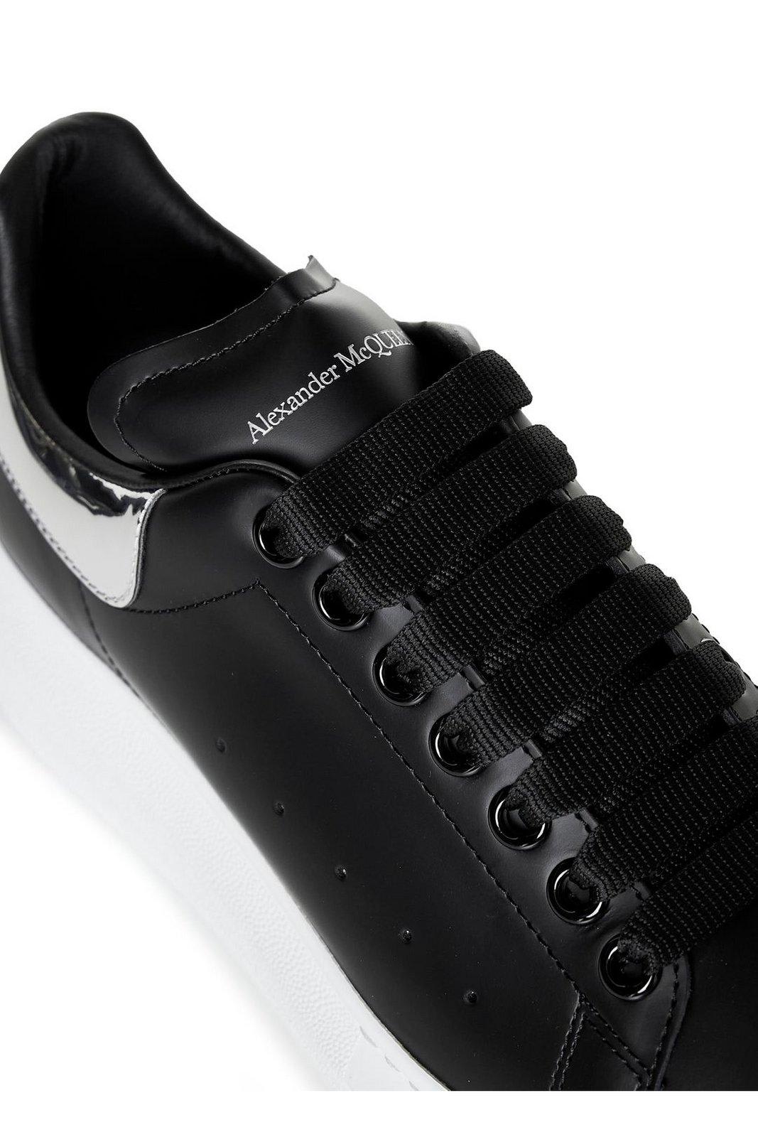Shop Alexander Mcqueen Round Toe Laced Sneakers In Black