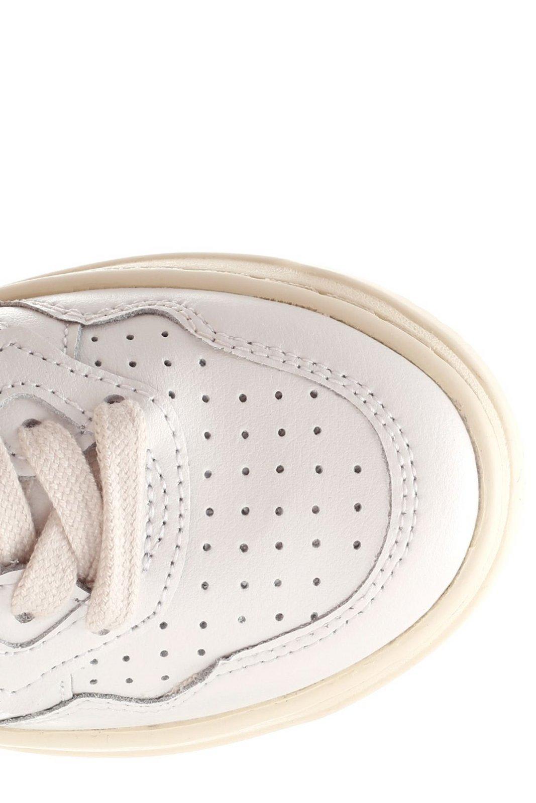 Shop Autry Logo Patch Panelled Sneakers In White