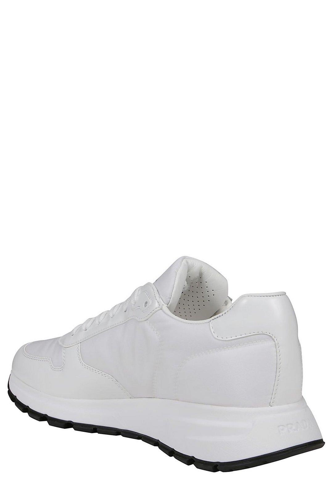 Shop Prada Triangle Logo Lace-up Sneakers In White