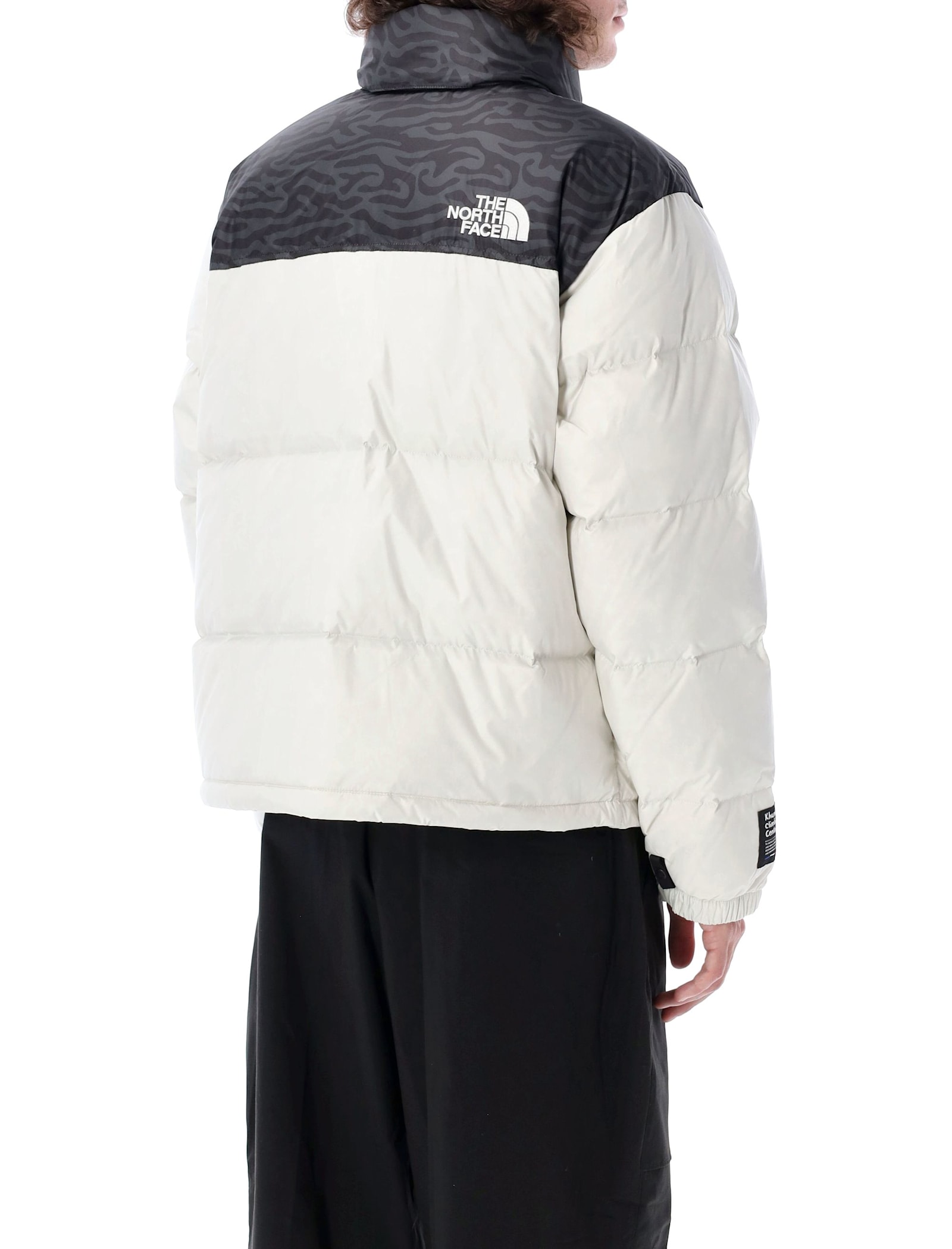 Shop The North Face 1996 Retro Nuptse Down Jacket In White Dune/tnf Black Tn