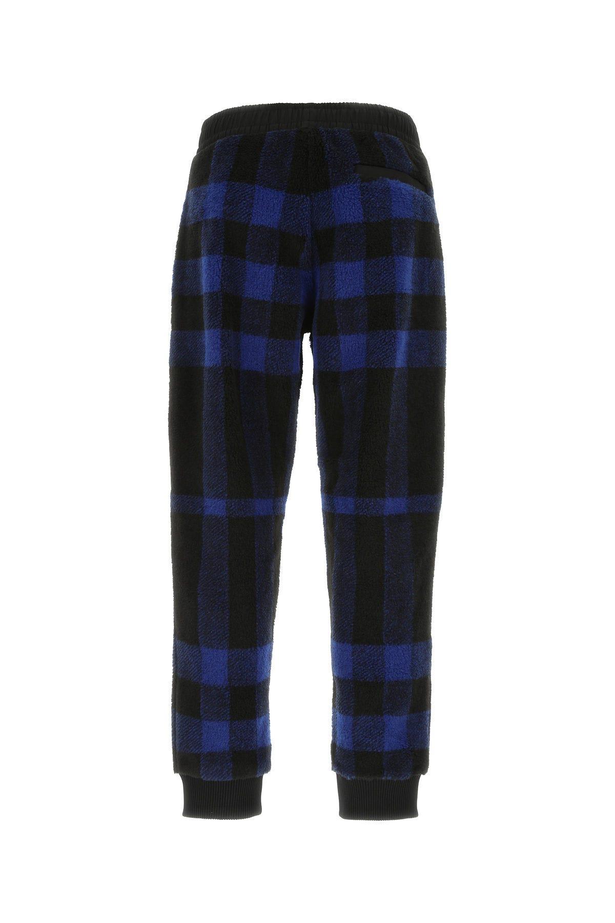 Shop Burberry Embroidered Pile Joggers In Blue
