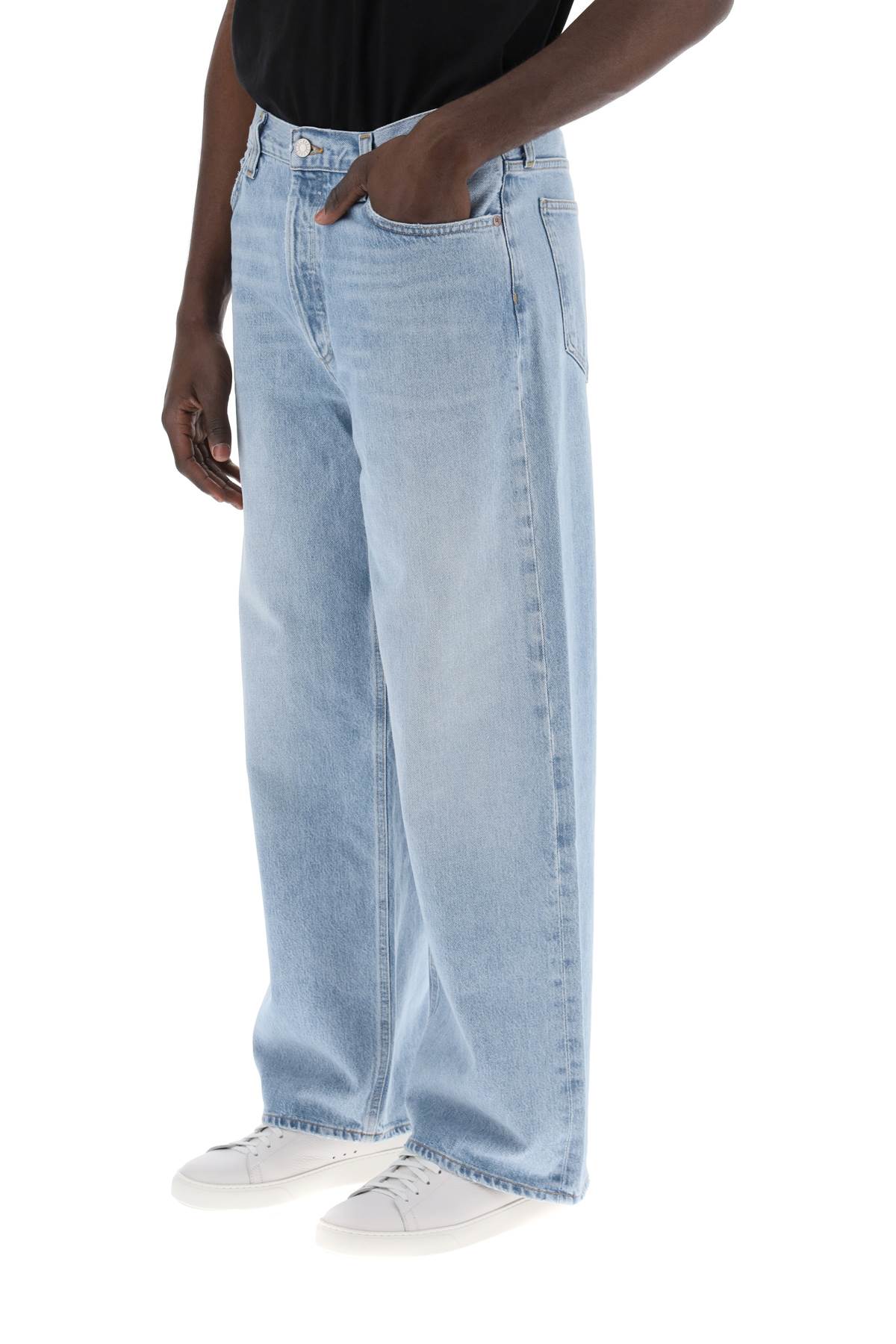 Shop Agolde Baggy Slung Jeans In Harmony (blue)