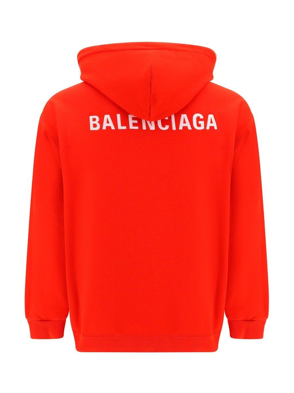 Shop Balenciaga Logo Printed Drawstring Hoodie In Red