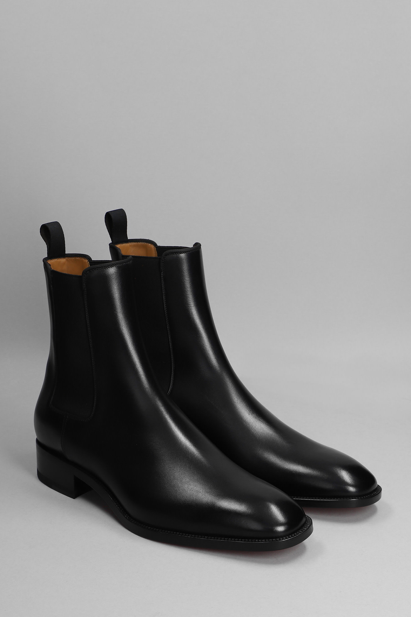 CHRISTIAN LOUBOUTIN SAMSON FLAT ANKLE BOOTS IN BLACK LEATHER
