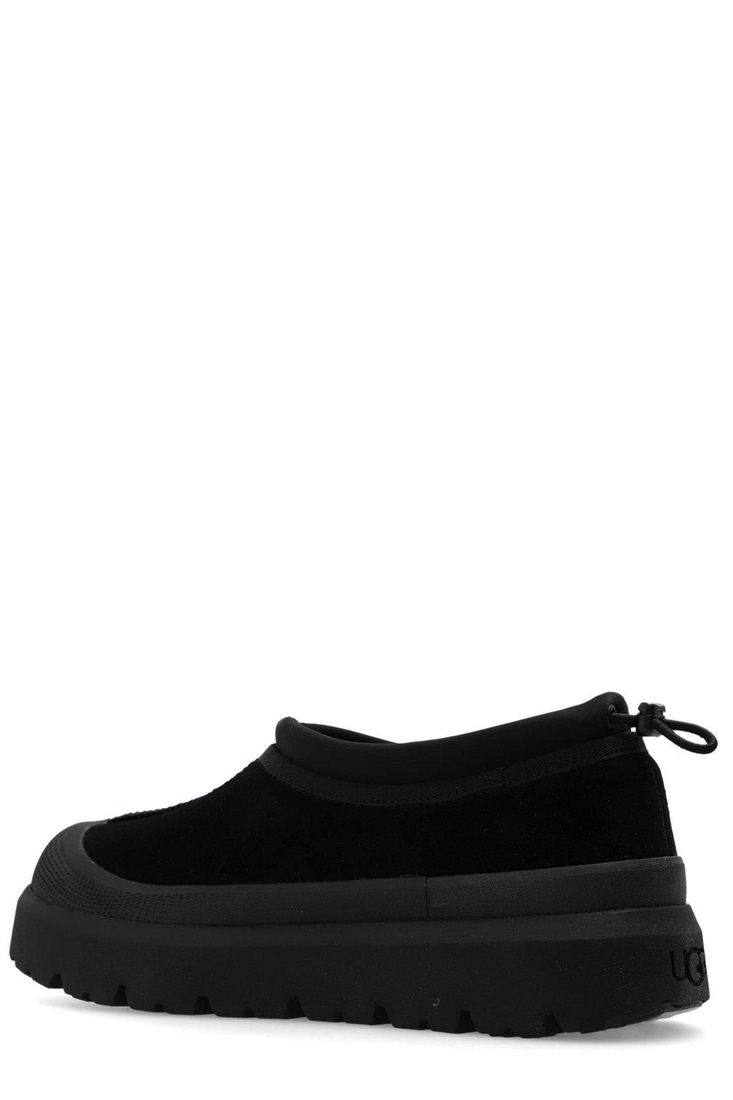 Shop Ugg Tasman Weather Hybrid Slip-on Slippers In Bblc Black / Black