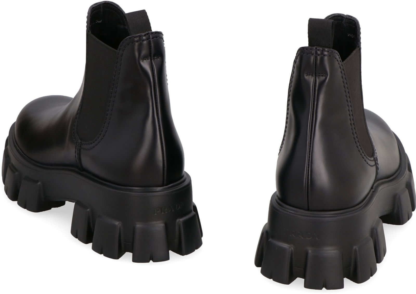 Shop Prada Monolith Leather Ankle Boots In Black