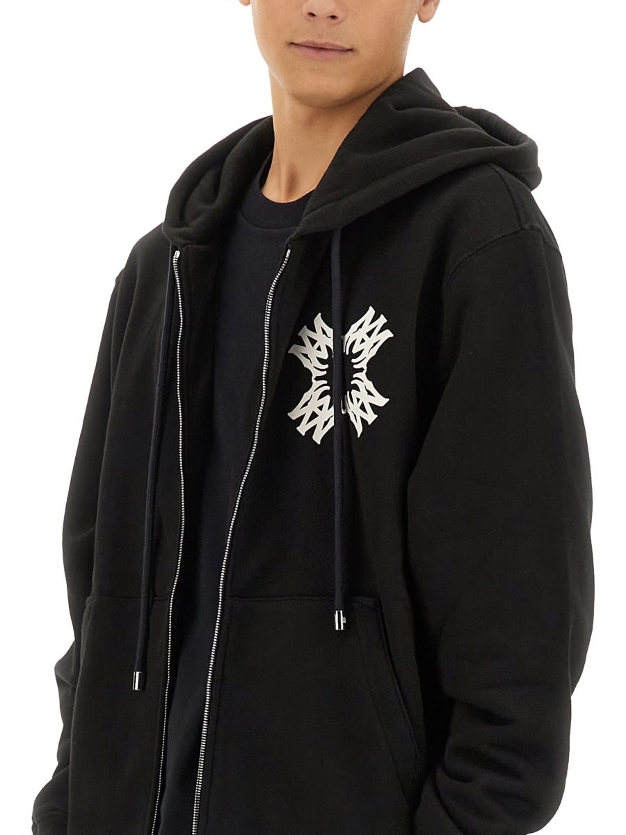 Shop Amiri Hoodie In Black