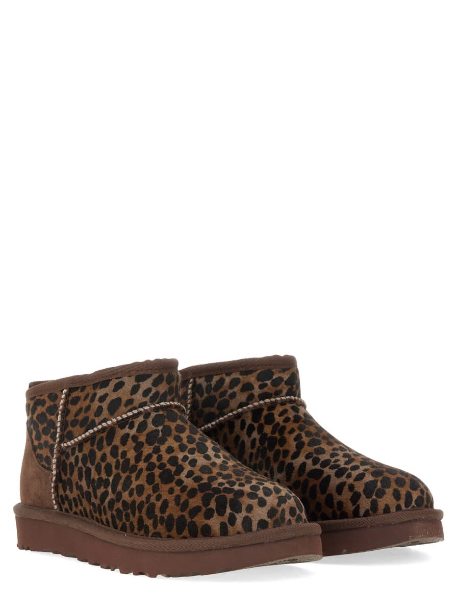 Shop Ugg Boot Classic Ultra Mini Caspian In Brown